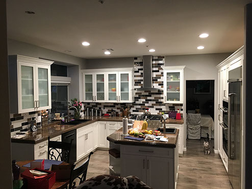 Frameless Alder Kitchen with Shaker Style doors with a Merlot Lacquer Finish