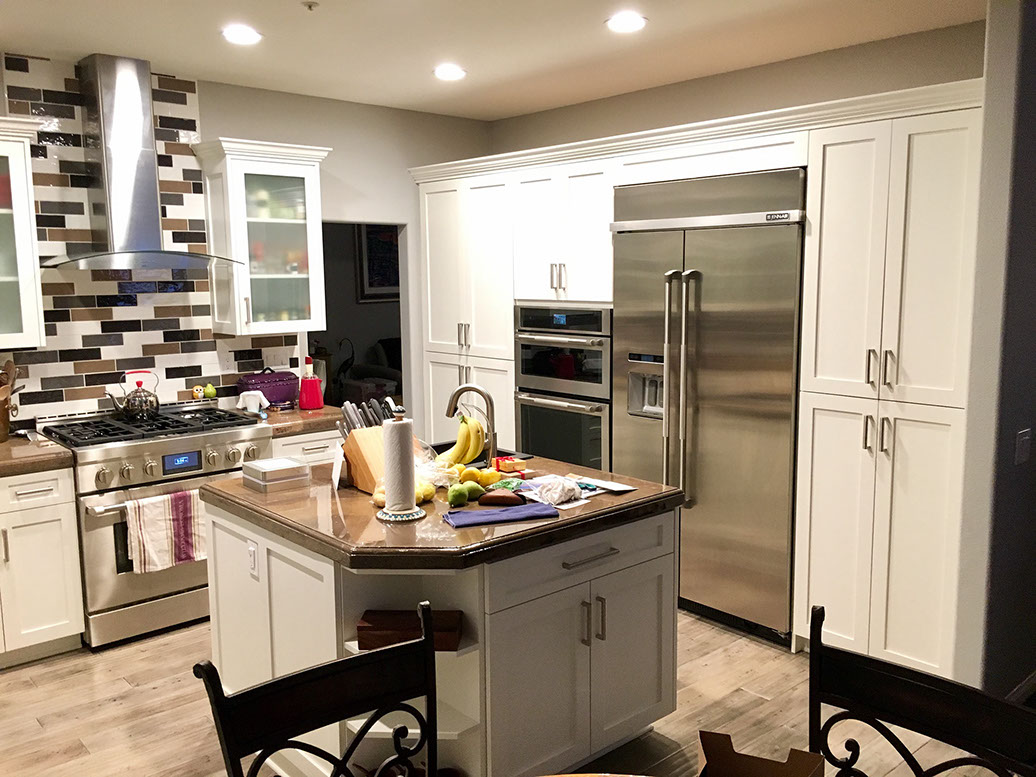 Frameless Alder Kitchen with Shaker Style doors with a Merlot Lacquer Finish