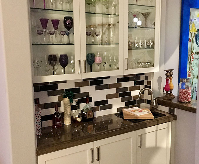 Traditional Paint Grade Entertainment Center with an Antique White Lacquer Finish