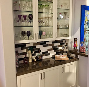 Traditional Paint Grade Entertainment Center with an Antique White Lacquer Finish