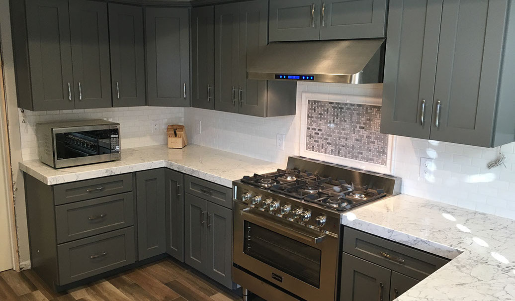 Frameless Alder Kitchen with Shaker Style doors with a Merlot Lacquer Finish