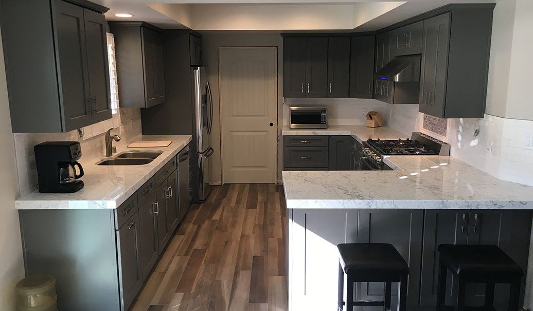 Frameless Alder Kitchen with Shaker Style doors with a Merlot Lacquer Finish