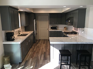 Frameless Alder Kitchen with Shaker Style doors with a Merlot Lacquer Finish