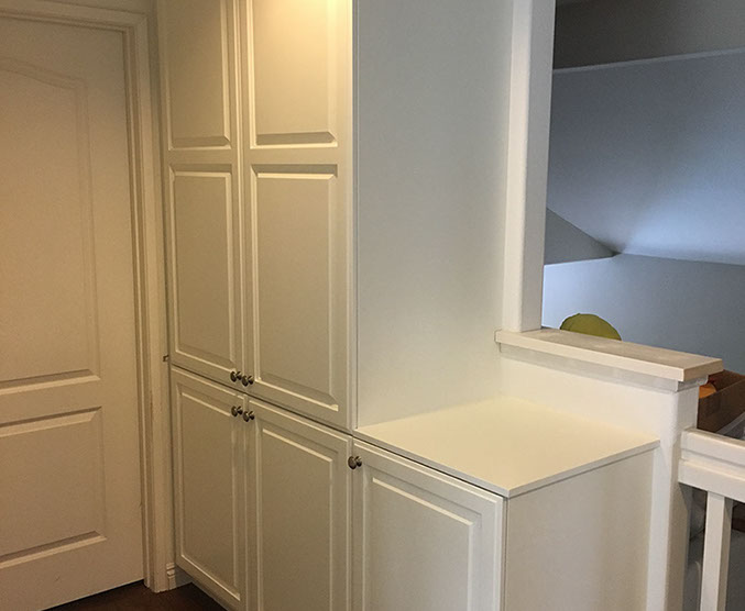 Traditional Paint Grade Entertainment Center with an Antique White Lacquer Finish