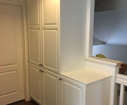 Traditional Paint Grade Entertainment Center with an Antique White Lacquer Finish