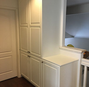 Traditional Paint Grade Entertainment Center with an Antique White Lacquer Finish