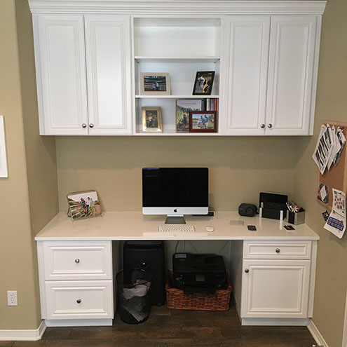 Traditional Paint Grade Entertainment Center with an Antique White Lacquer Finish