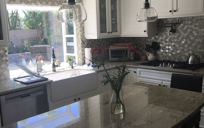 Frameless Alder Kitchen with Shaker Style doors with a Merlot Lacquer Finish