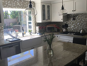 Frameless Alder Kitchen with Shaker Style doors with a Merlot Lacquer Finish