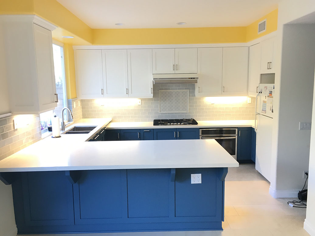 Frameless Alder Kitchen with Shaker Style doors with a Merlot Lacquer Finish