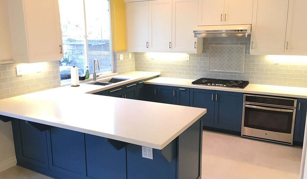 Frameless Alder Kitchen with Shaker Style doors with a Merlot Lacquer Finish