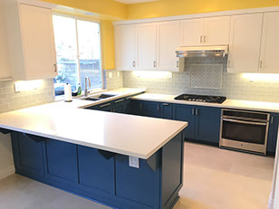 Frameless Alder Kitchen with Shaker Style doors with a Merlot Lacquer Finish