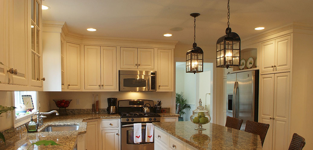 Traditional beaded inset paint grade kitchen, with a swiss coffee lacquer finsh.