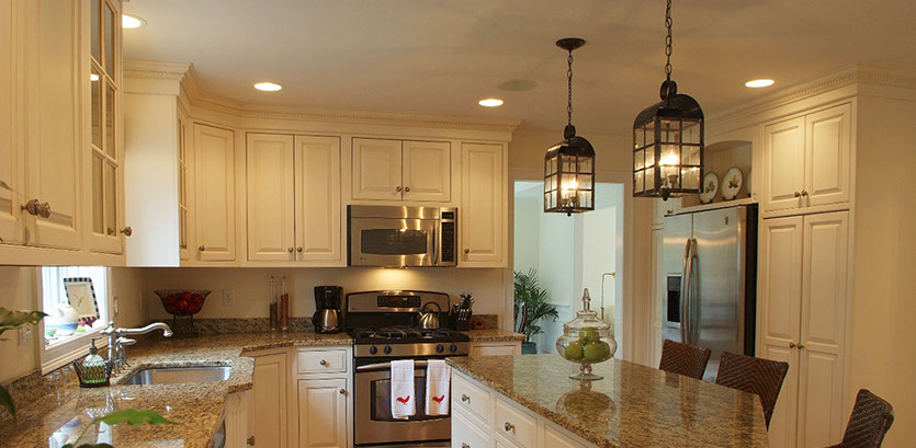 Traditional beaded inset paint grade kitchen, with a swiss coffee lacquer finsh.