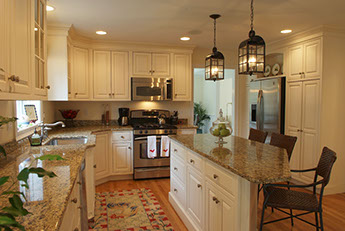 Traditional beaded inset paint grade kitchen, with a swiss coffee lacquer finsh.