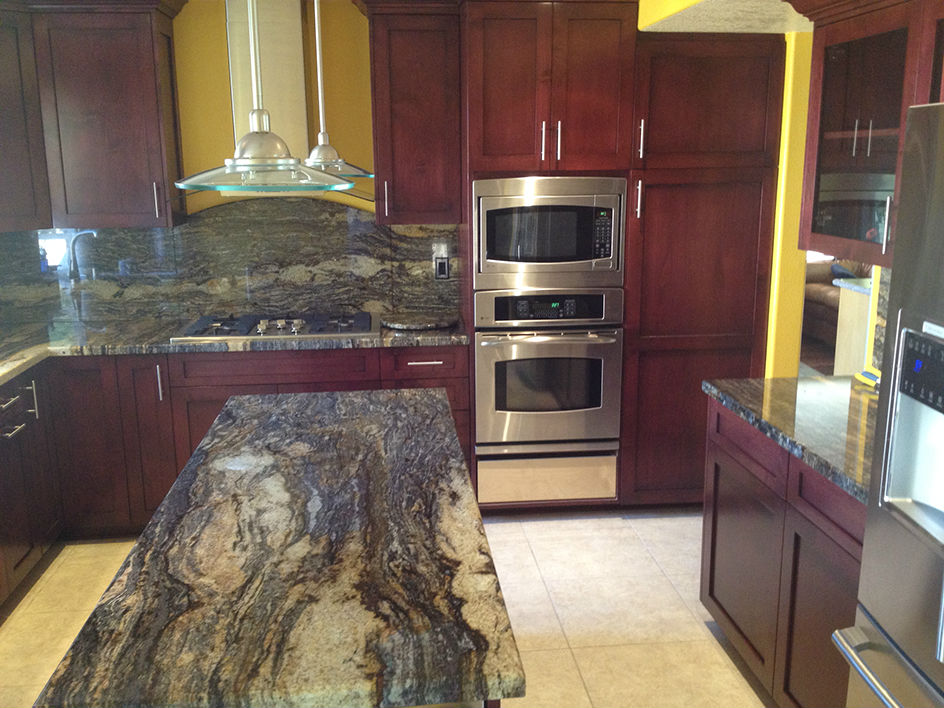 Frameless Alder Kitchen with Shaker Style doors with a Merlot Lacquer Finish