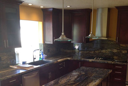 Frameless Alder Kitchen with Shaker Style doors with a Merlot Lacquer Finish