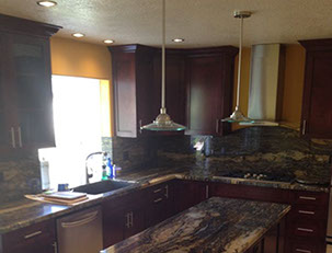 Frameless Alder Kitchen with Shaker Style doors with a Merlot Lacquer Finish