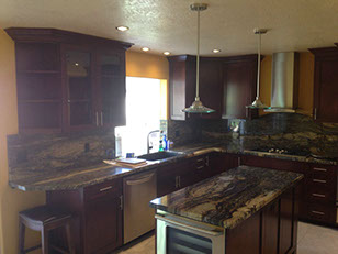 Frameless Alder Kitchen with Shaker Style doors with a Merlot Lacquer Finish