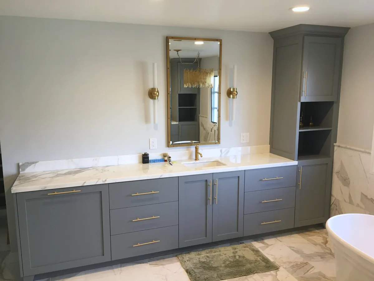 Gray double vanity with brass hardware and a tall linen tower, Hidden Hills