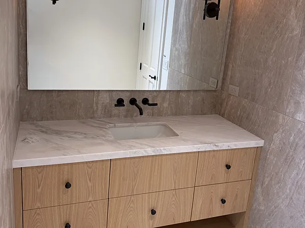White oak vanity with drawers and a wall-mounted faucet, Thousand Oaks