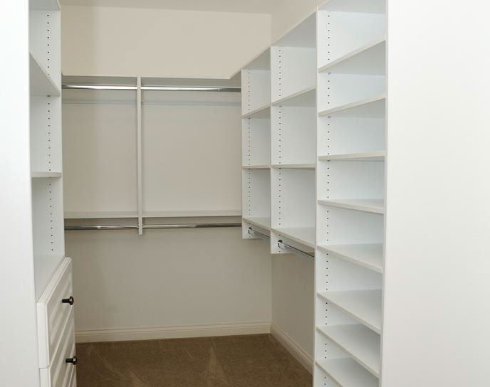 Custom Paint Grade Wainscoting and Crown Molding with a Swiss Coffee Lacquer Finish.